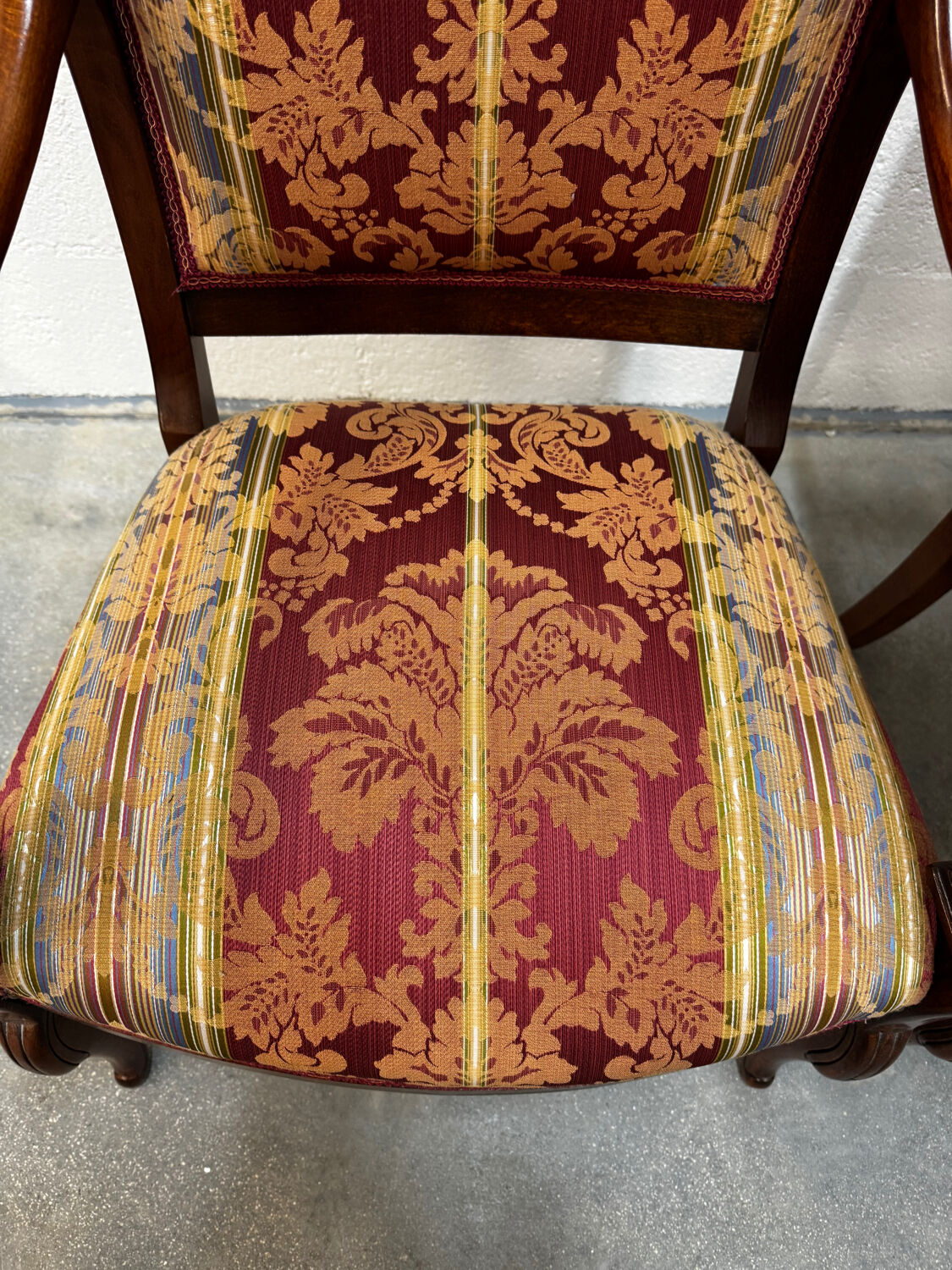 Pair of cross-back armchairs, Empire style, 19th century.