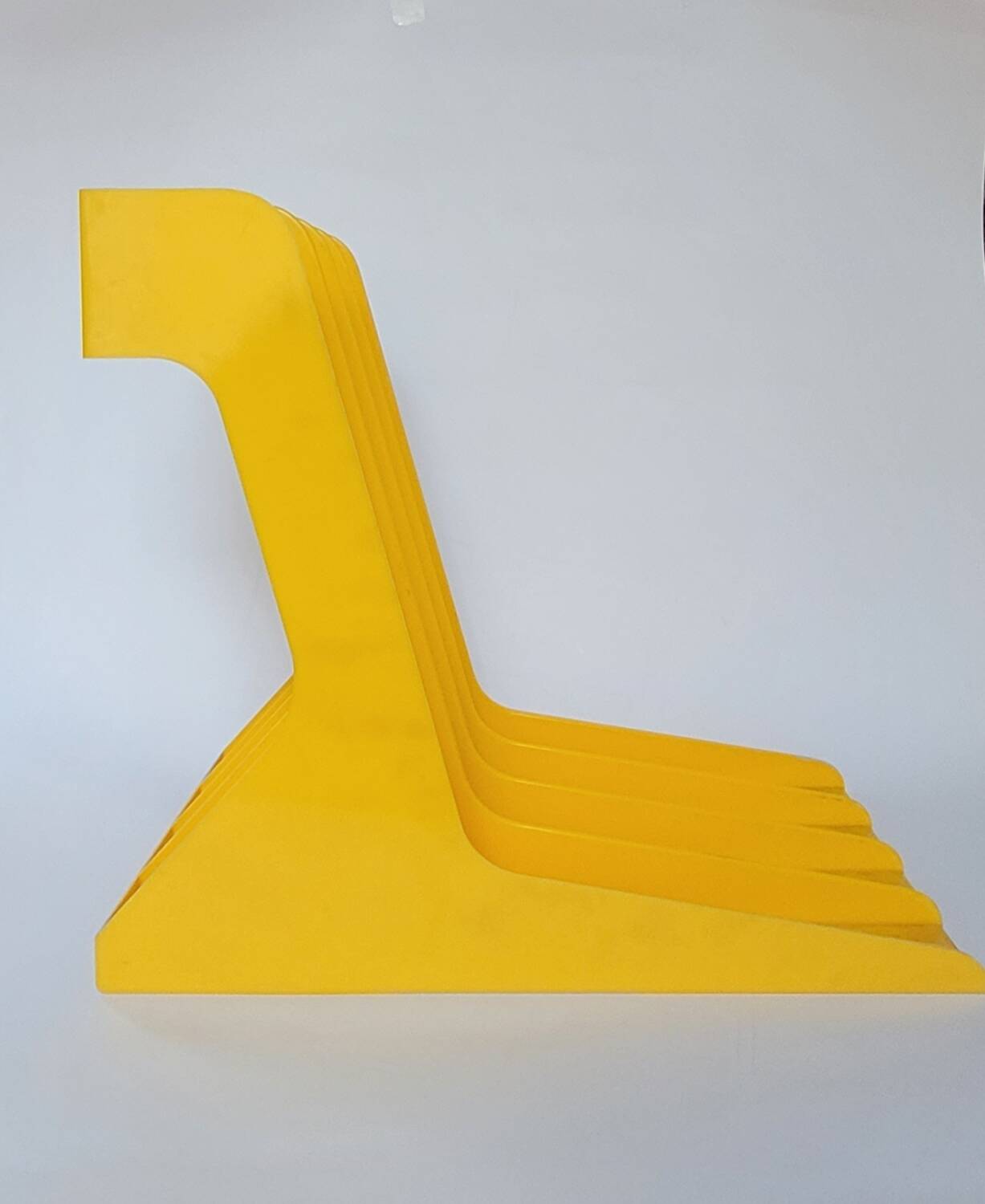 Yellow plastic vinyl racks from the 70s