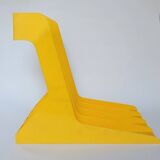 Yellow plastic vinyl racks from the 70s