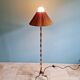 Brass floor lamp with rattan shade, 1950s-60s.