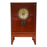 Antique red cabinet with brass details