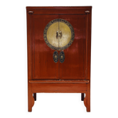Antique red cabinet with brass details