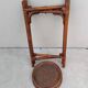 Vintage folding wooden and wicker side table.