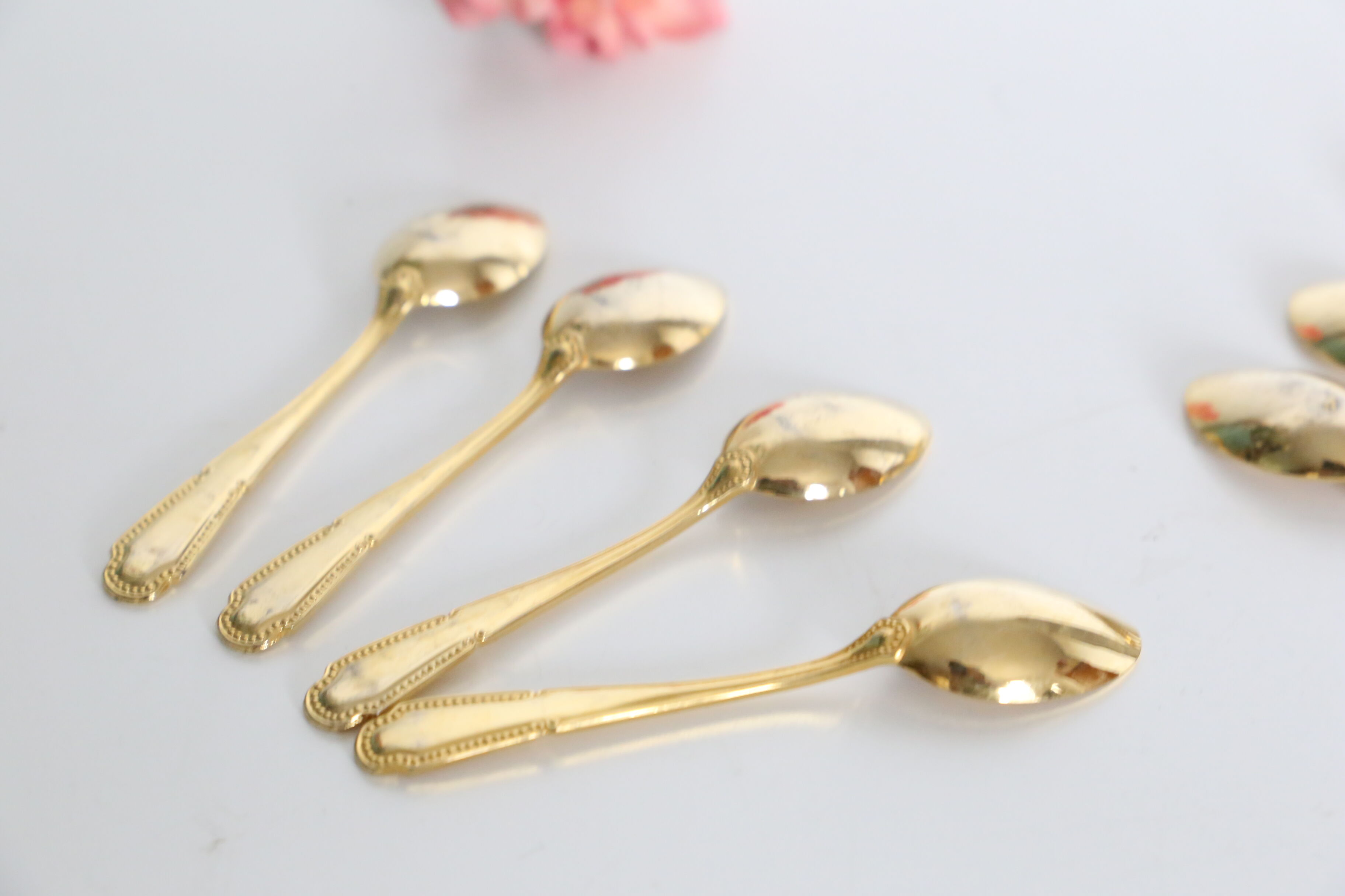 Service of 9 small golden spoons, vintage