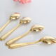 Service of 9 small golden spoons, vintage
