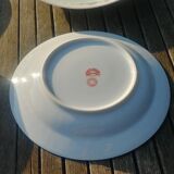 Set of four hollow Limoges porcelain plates signed Robert Haviland & Le Tanneur
