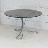 Living room table "Space Age" polished steel, circular slab smoked glass. France, circa 1970.
