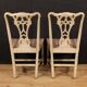 Paire de chaises italiennes laquées et dorées