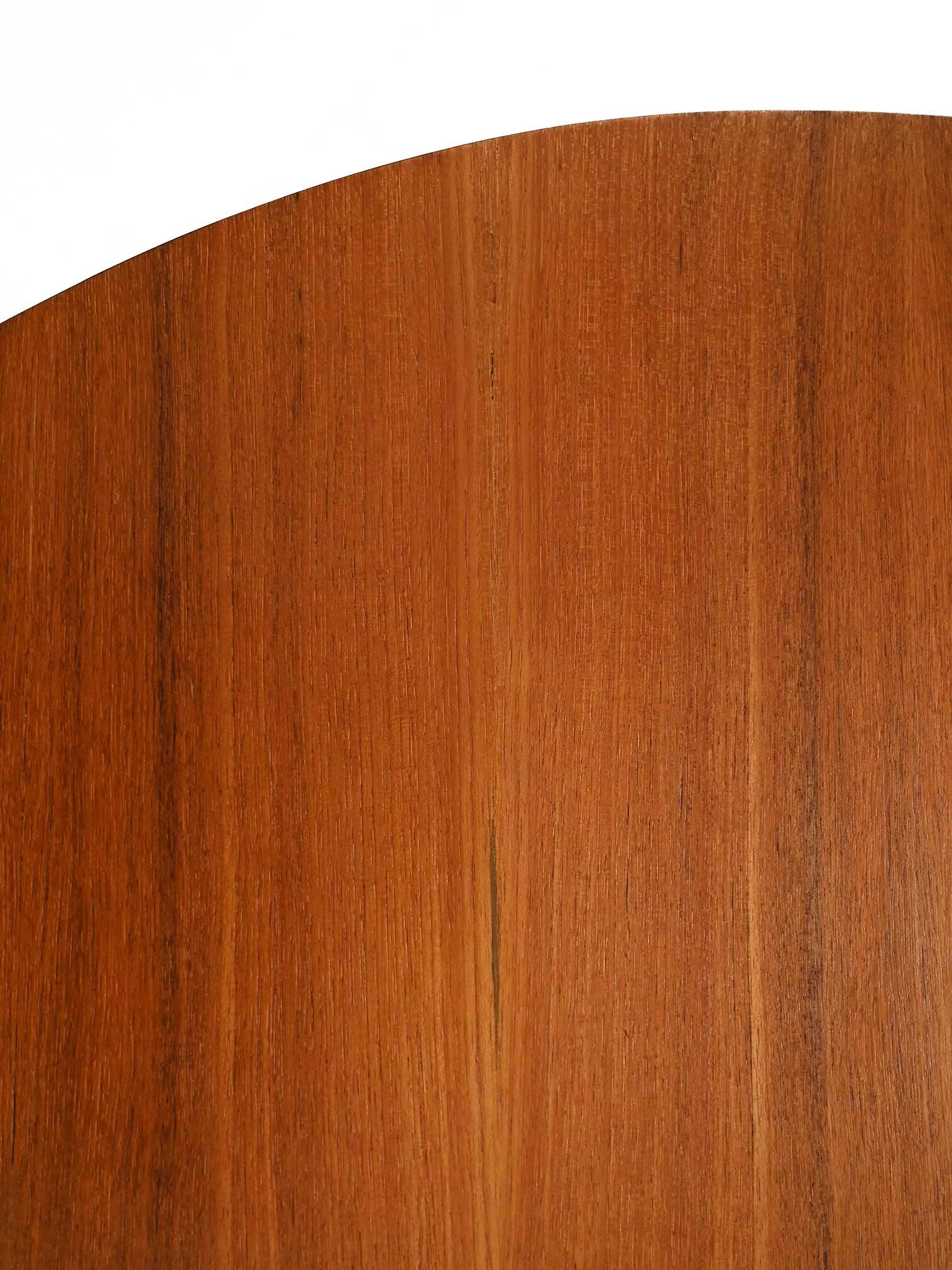 Round Scandinavian teak table with metal base