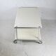 Table basse en acier laqué "crème", double plateaux, France, circa 1970