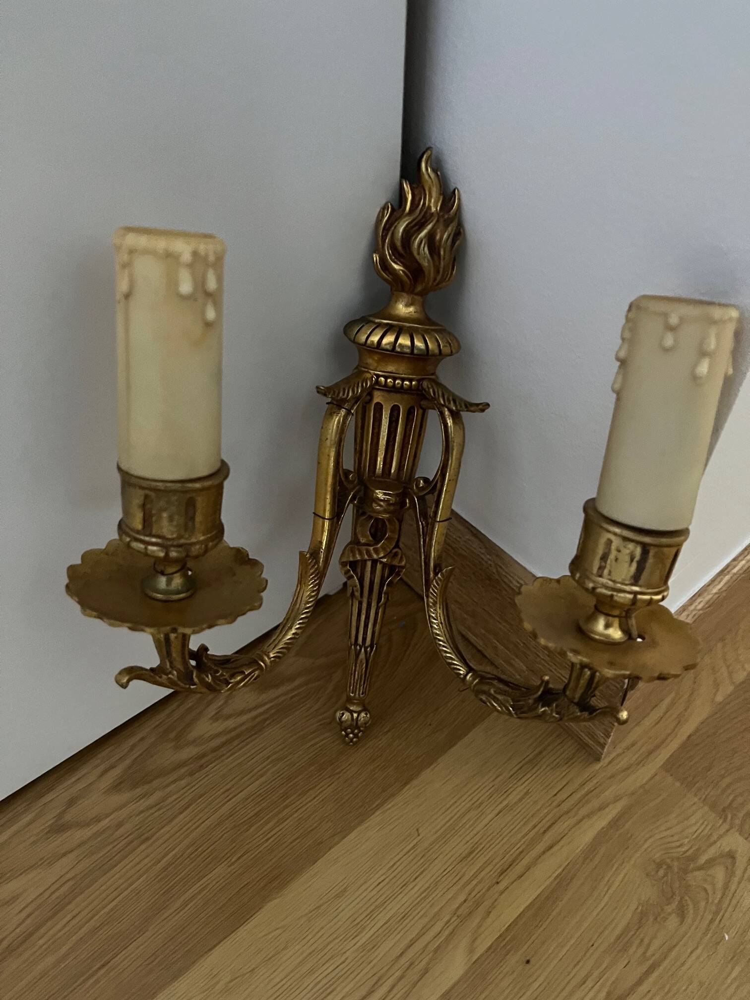 Pair of Louis XVI style bronze wall lights