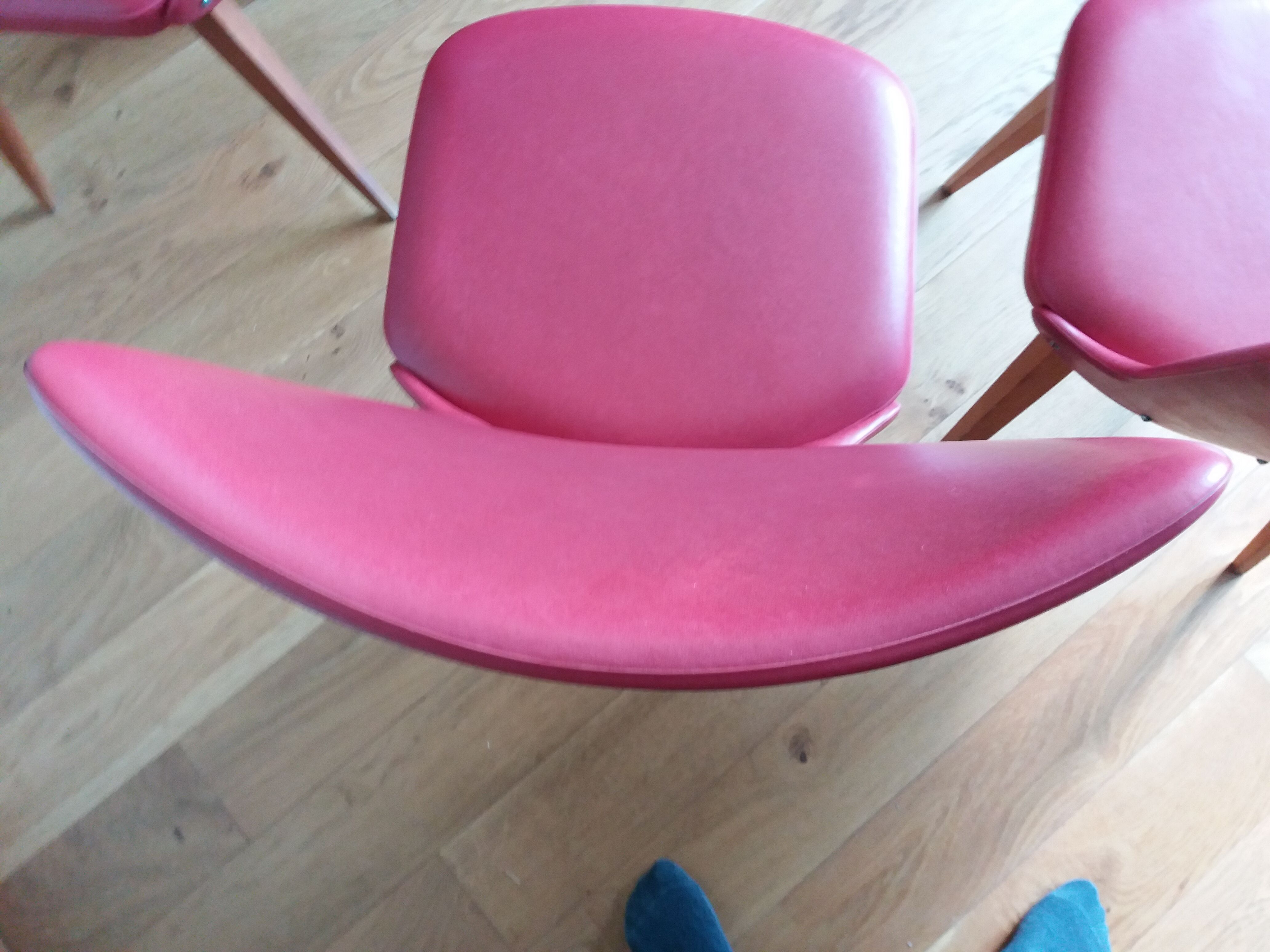 Baumann skai red imitation leather chairs from the 1950s