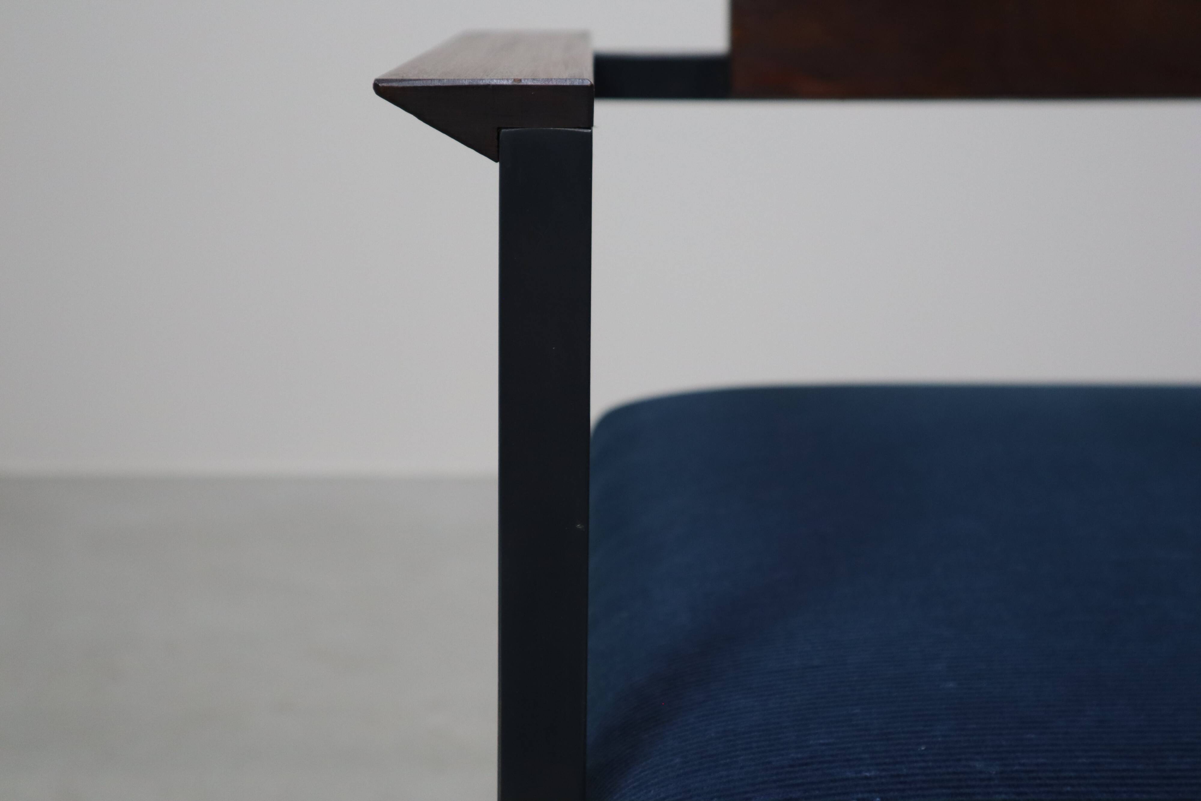 Pair of Postmodern armchairs in steel and mahogany, 1970s