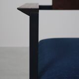 Pair of Postmodern armchairs in steel and mahogany, 1970s