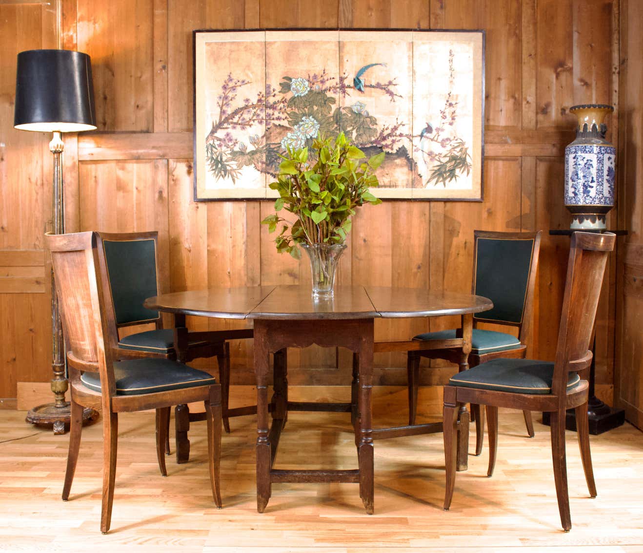 Art Deco set of four Jaguar green wooden and leatherette chairs, circa 1950