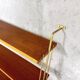 Vintage wall shelf in teak and golden brass String Tomado style