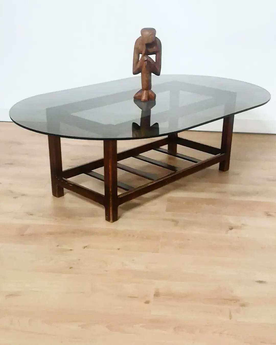 Scandinavian oval smoked glass coffee table