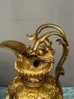 Pair of neo-Renaissance gilt bronze pitchers.