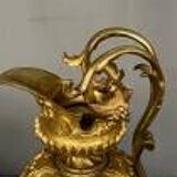 Pair of neo-Renaissance gilt bronze pitchers.