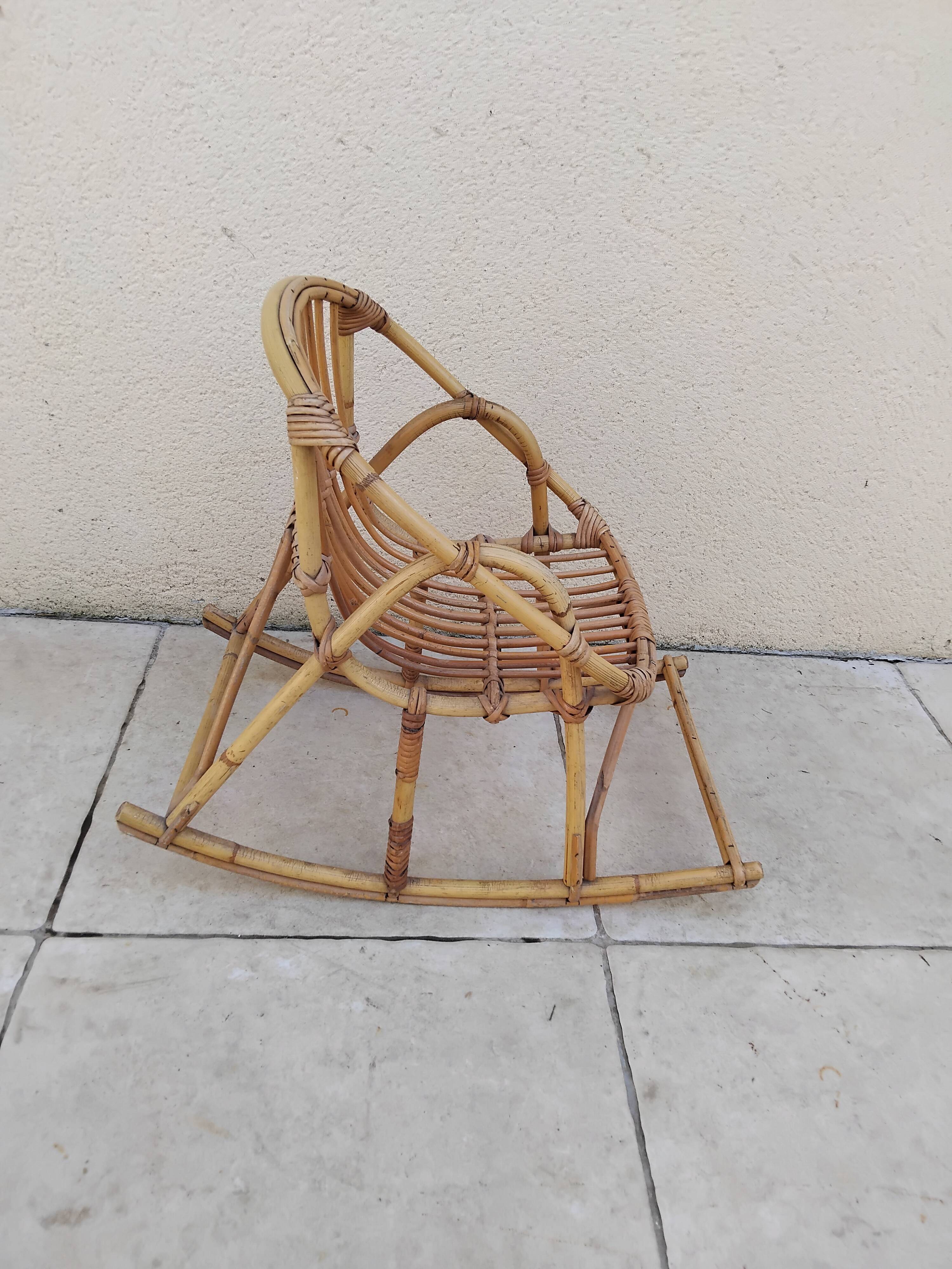 Vintage children's rattan rocking chair