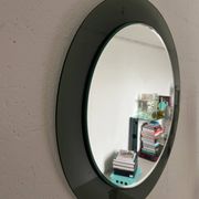 Decorative round wall mirror in smoked glass, Space Age Italian collectible