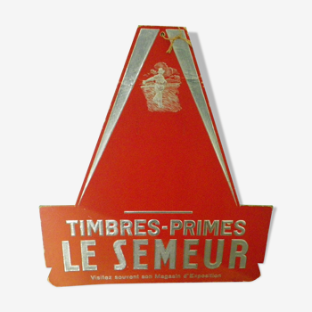 Plaque publicitaire "timbres primes le semeur" par  le concepteur ets Bouche & Valletton