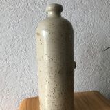 Bottle in sandstone
