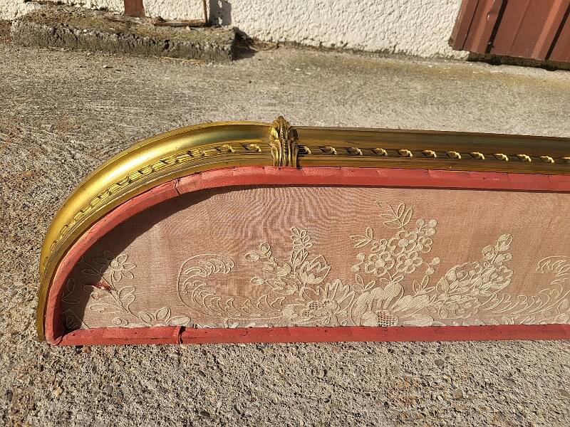 Old bed canopy in yellow copper and bronze