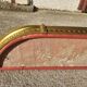 Old bed canopy in yellow copper and bronze