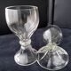 2 old gondola-shaped glasses, flat sides, hollow stem