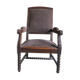 Armchair trimmed with brown fabric
