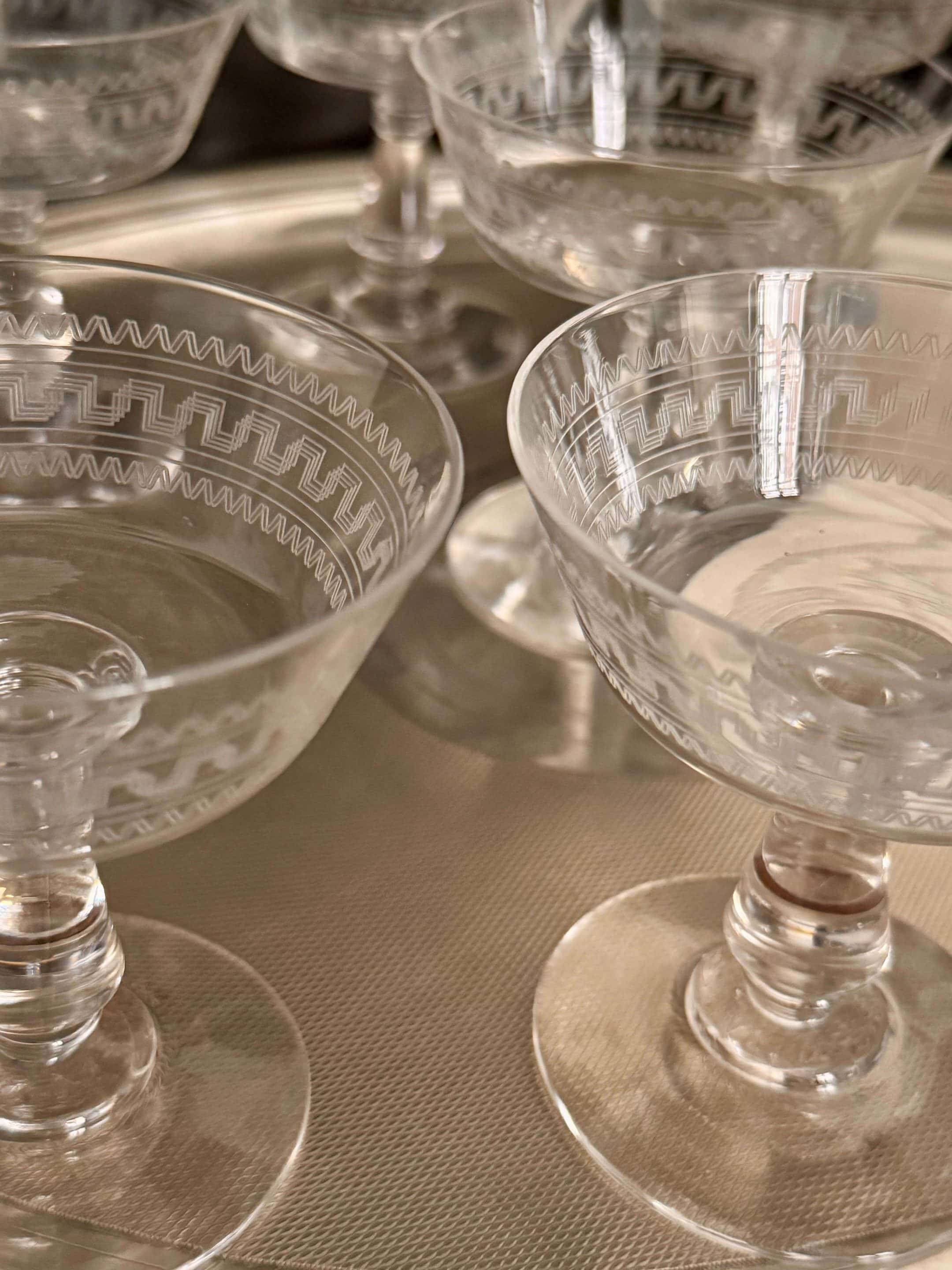 Baccarat, set of 10 engraved crystal champagne glasses from 1900.