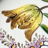 Decorative earthenware and pewter wall plate with spring flowers