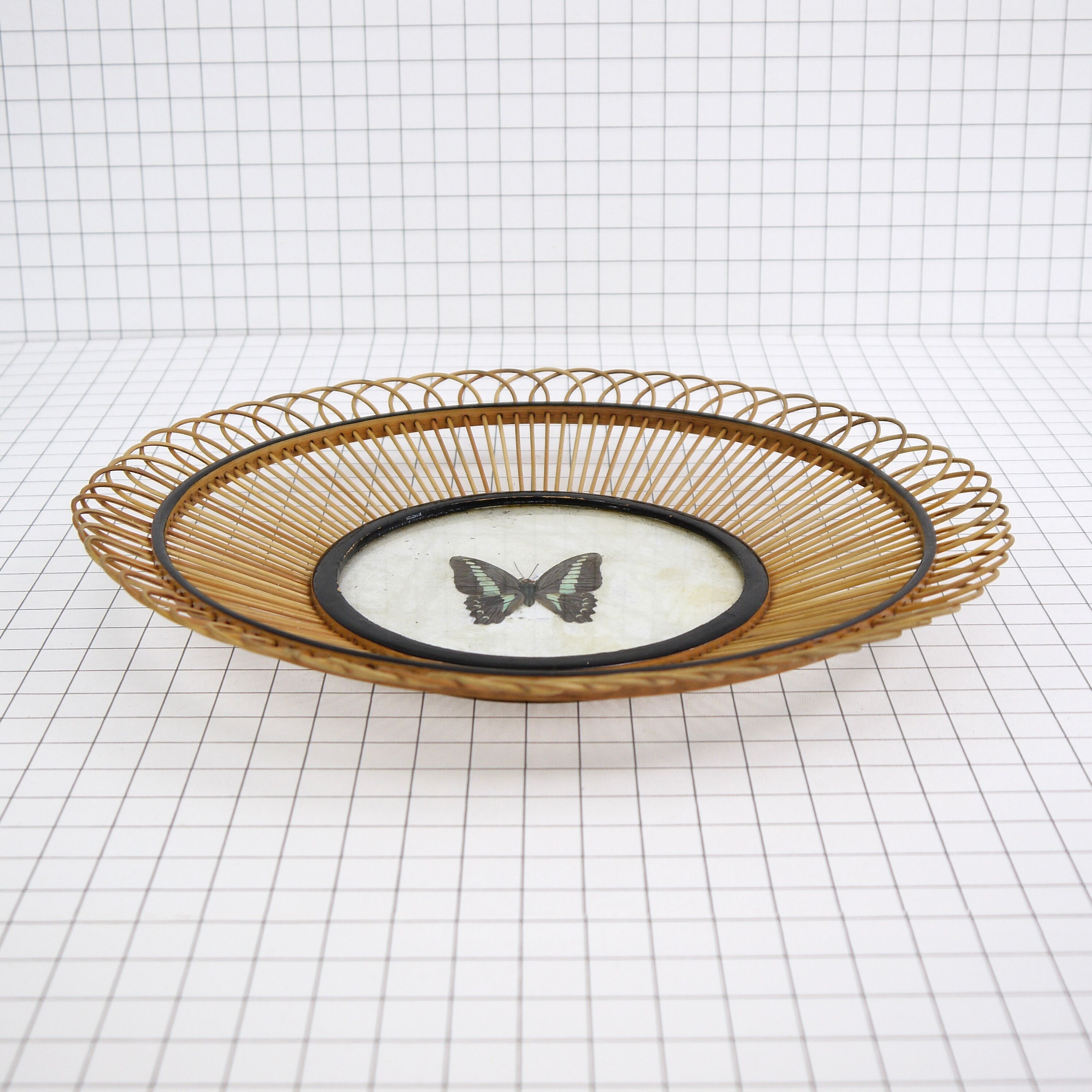 Wicker fruit basket with butterfly
