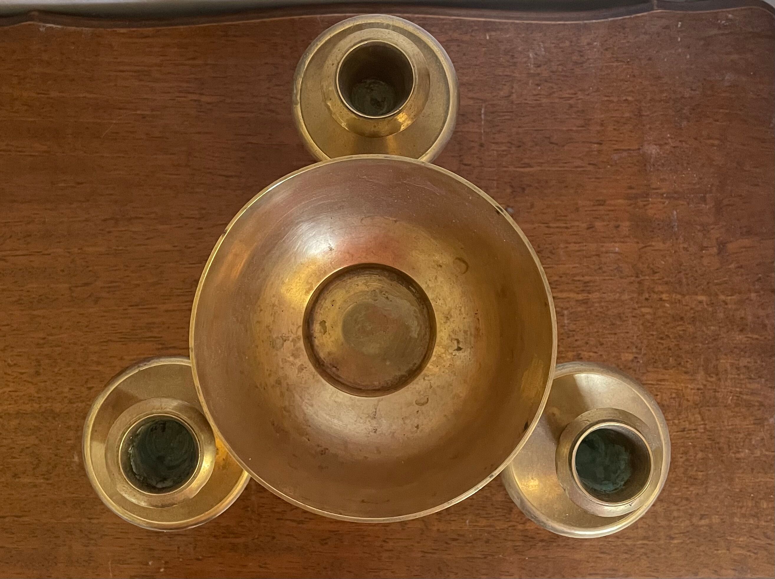 Pair of solid brass calyx candlesticks