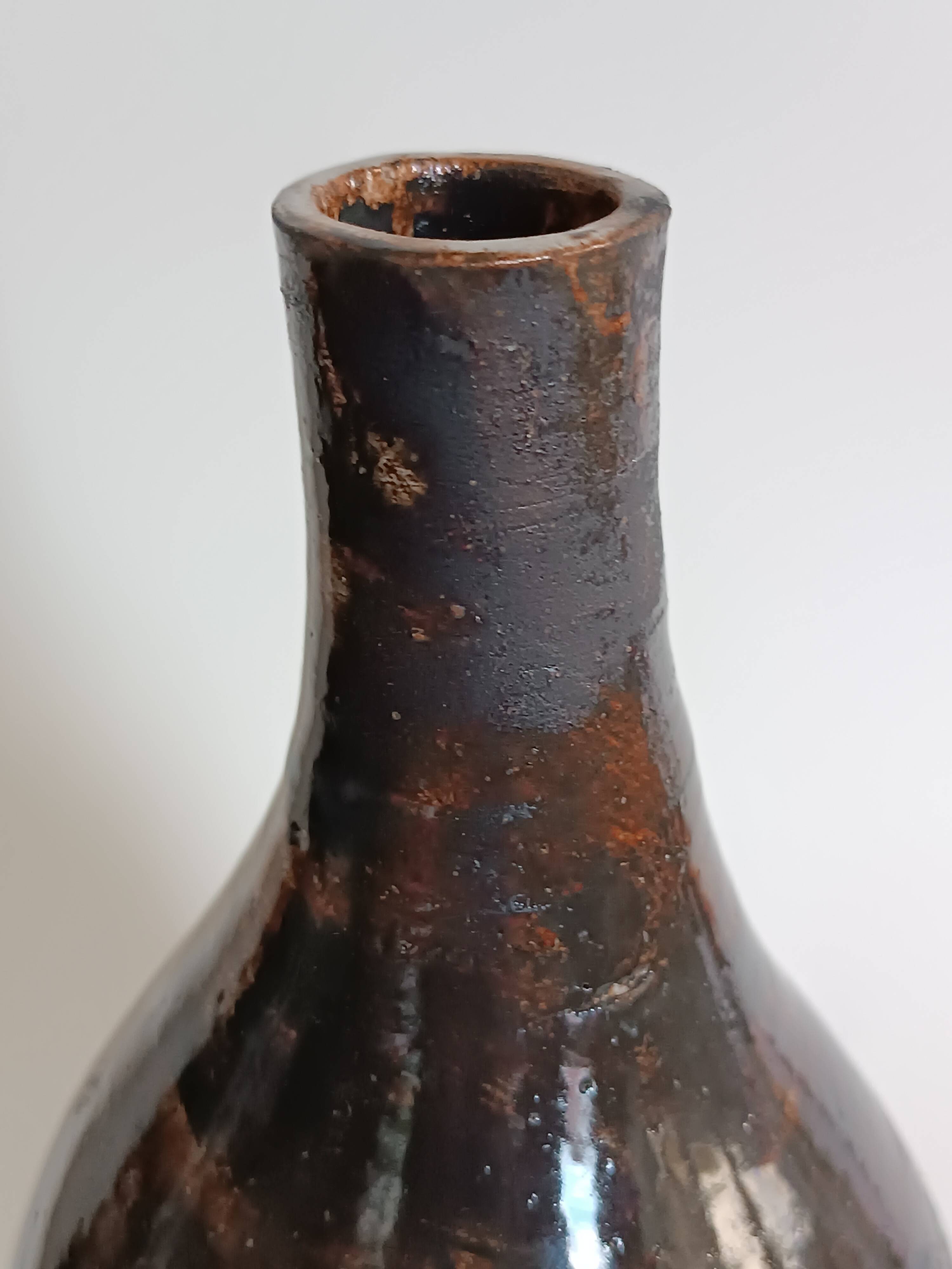 A bottle and six ceramic cups by Gérard Hofmann Vallauris 1950.