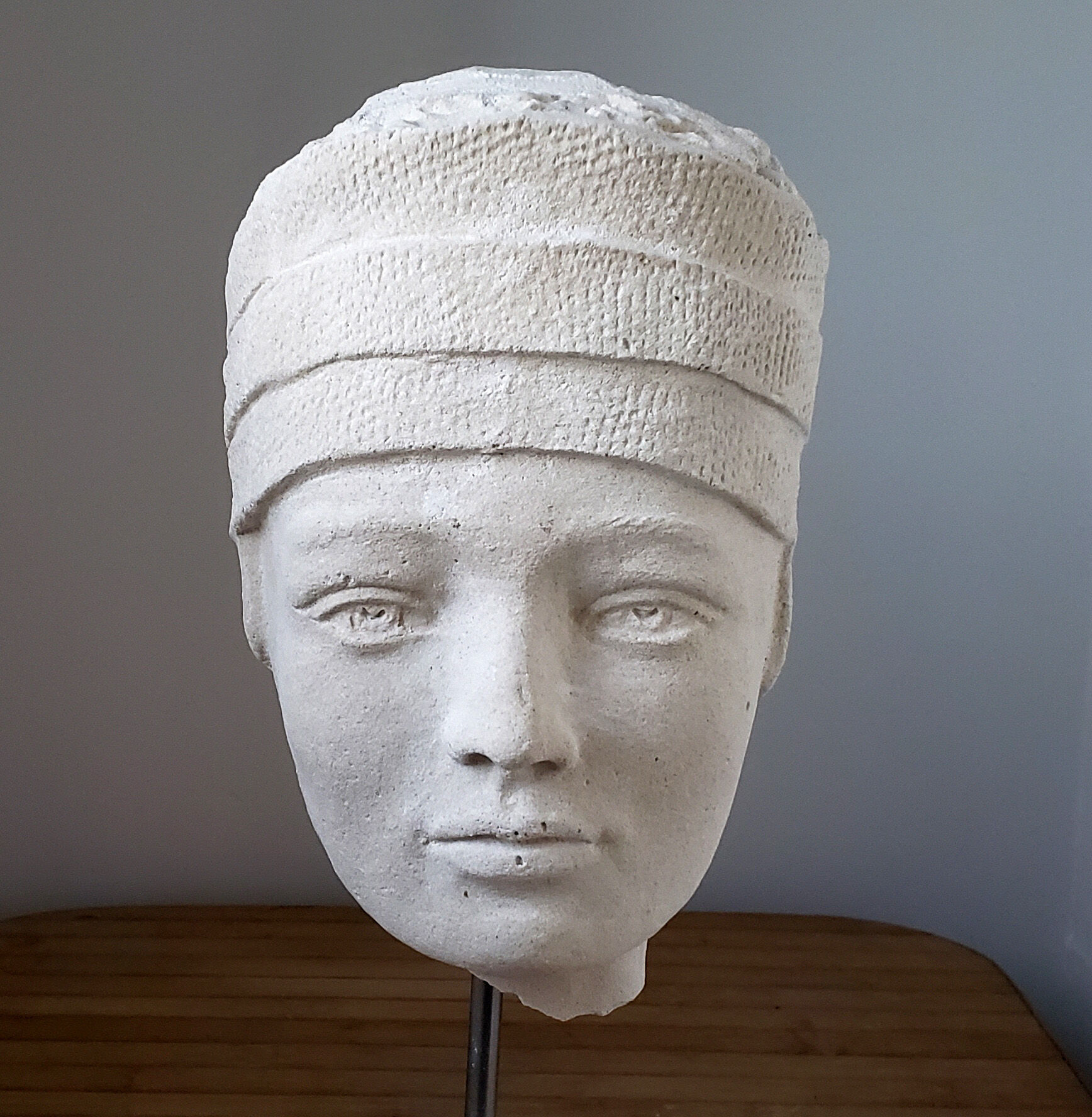 Androgynous head in plaster
