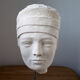 Androgynous head in plaster