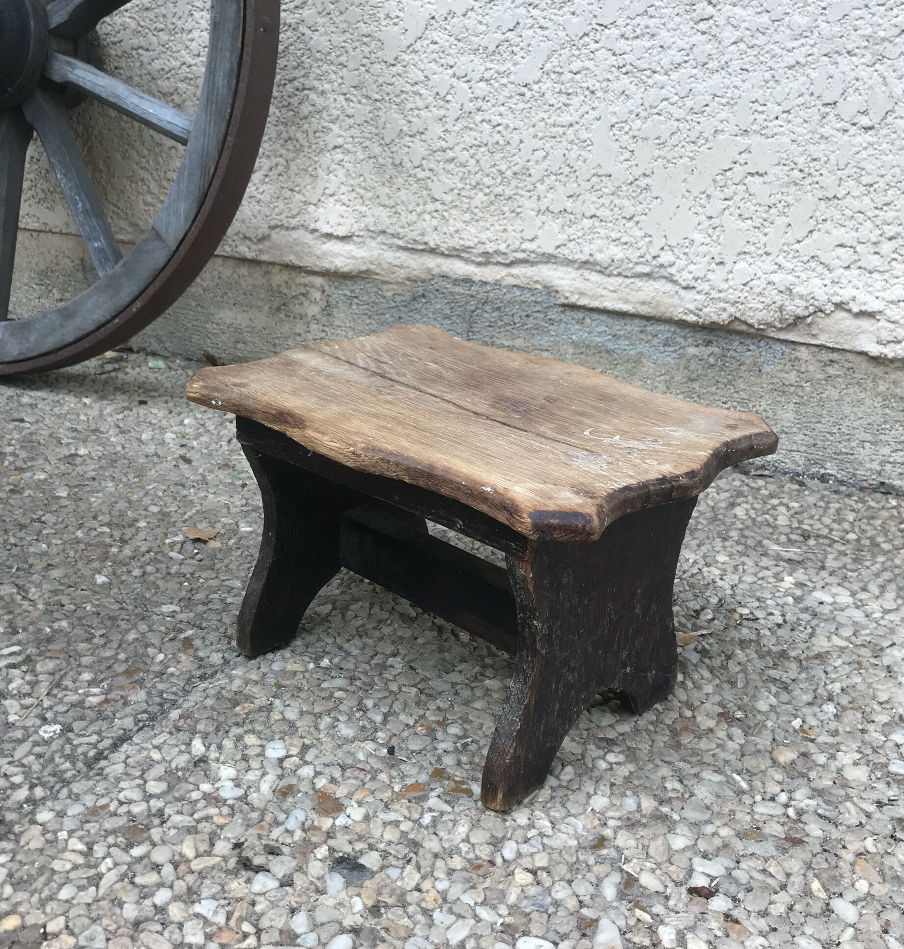 Walking stool feet in old wood