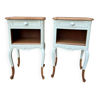 Renovated bedside tables in laurel green and light wood.
