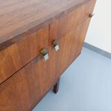 Vintage Scandinavian style row in rosewood and brass from the 60s