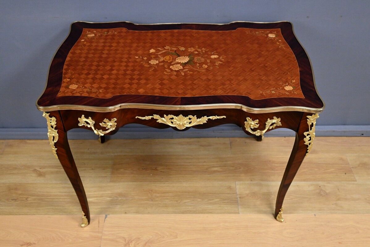 Rosewood, mahogany, and rosewood desk-table, Louis XV style – early 20th century.