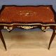 Rosewood, mahogany, and rosewood desk-table, Louis XV style – early 20th century.