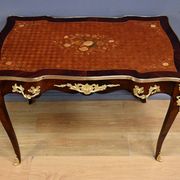 Rosewood, mahogany, and rosewood desk-table, Louis XV style – early 20th century.