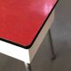 Tabouret coffre formica rouge