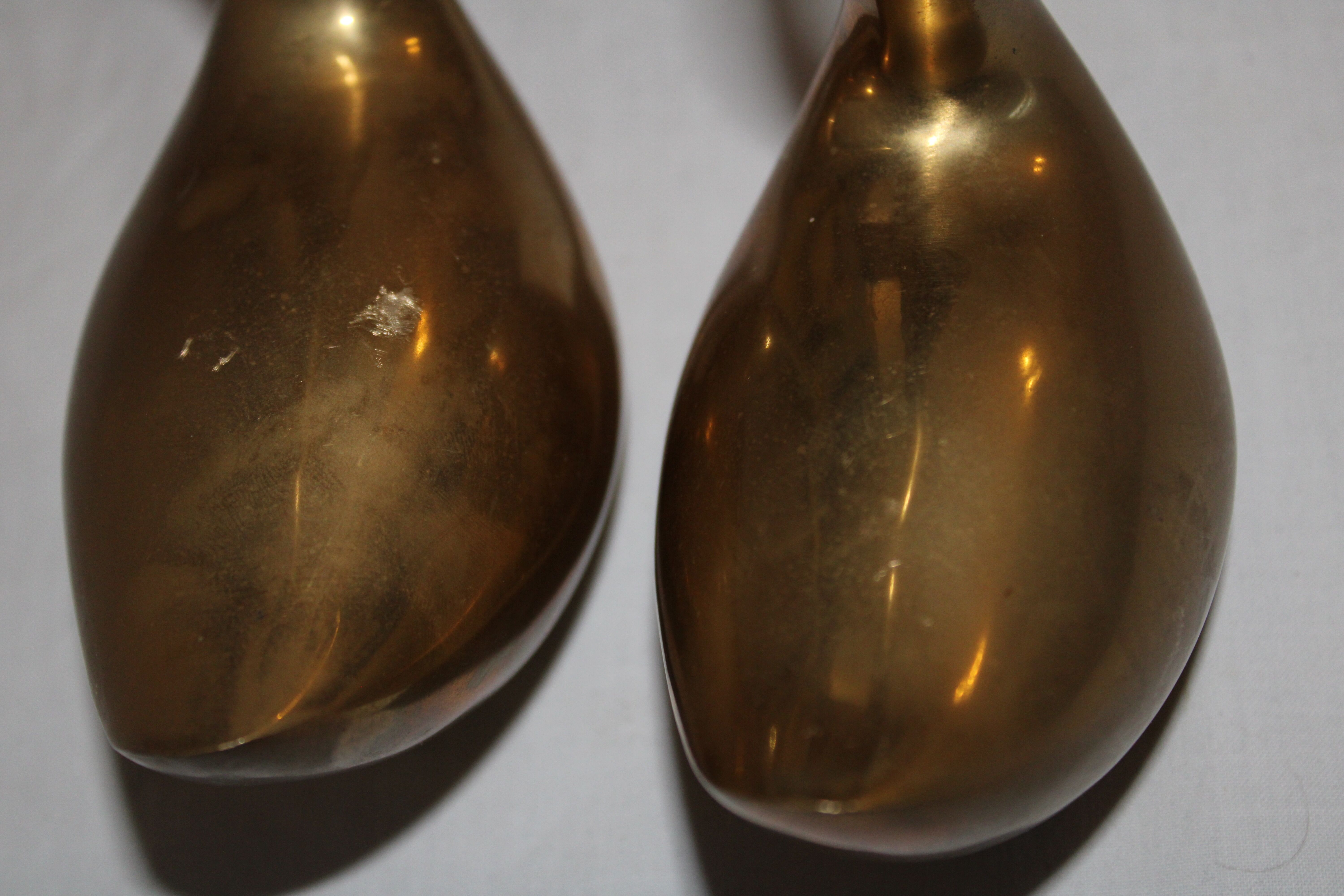 Couple of swans in vintage brass