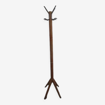 Old coat rack in blond wood, compass feet