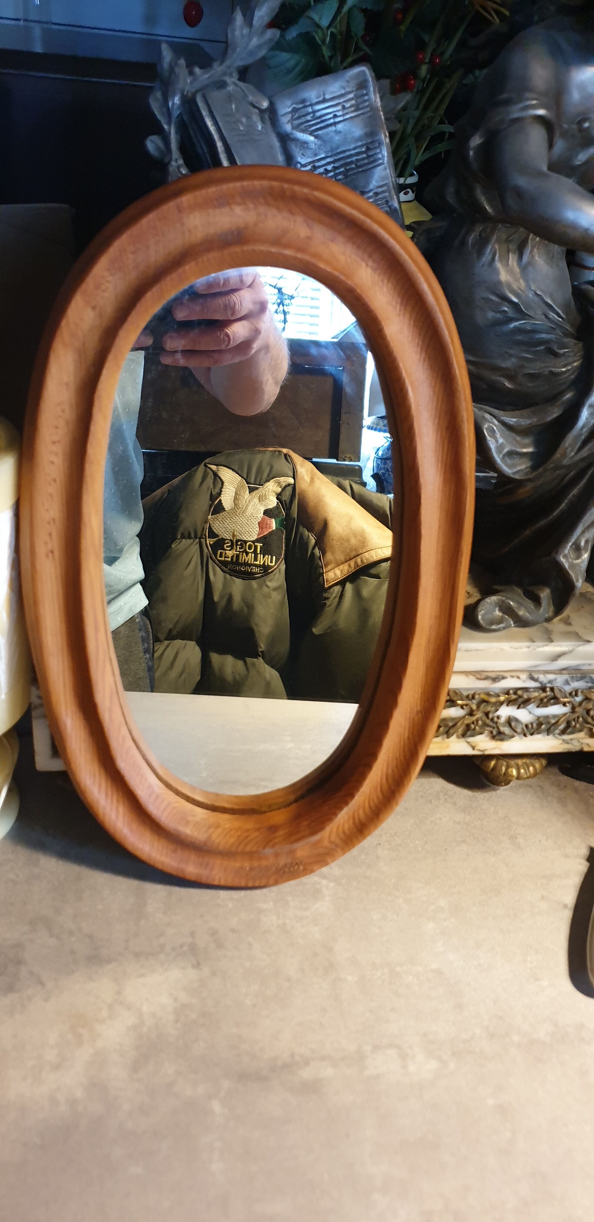 Oval solid wood mirror