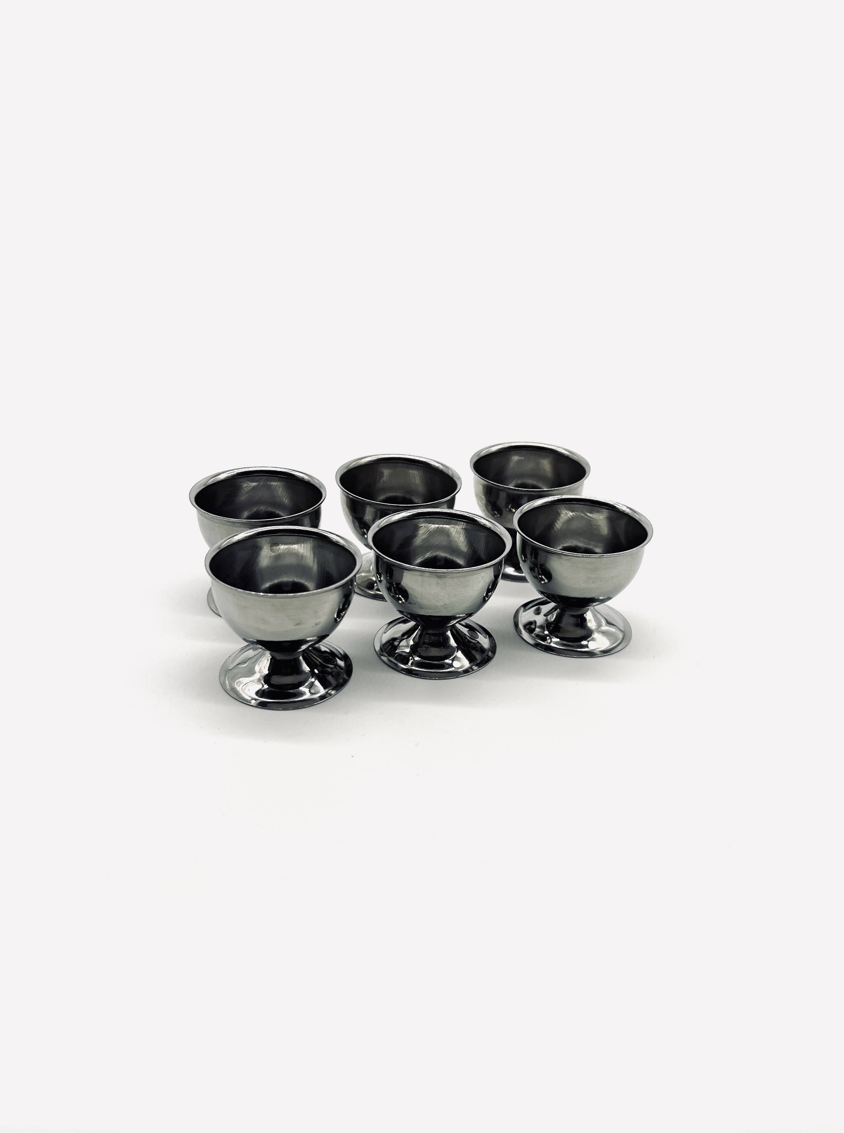 Six stainless steel egg cups