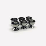 Six stainless steel egg cups